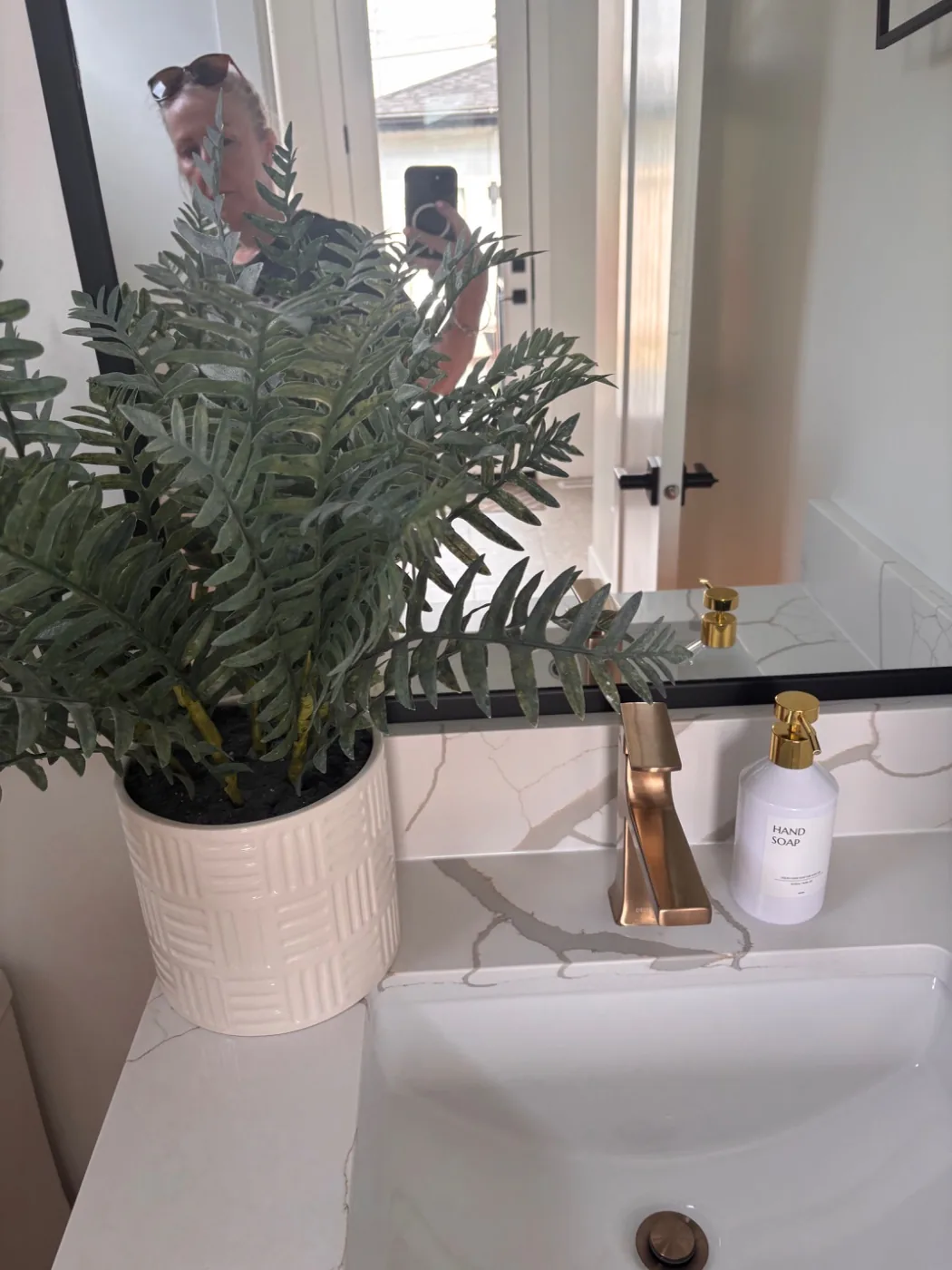 Bathroom counter styled with amenities after a clean