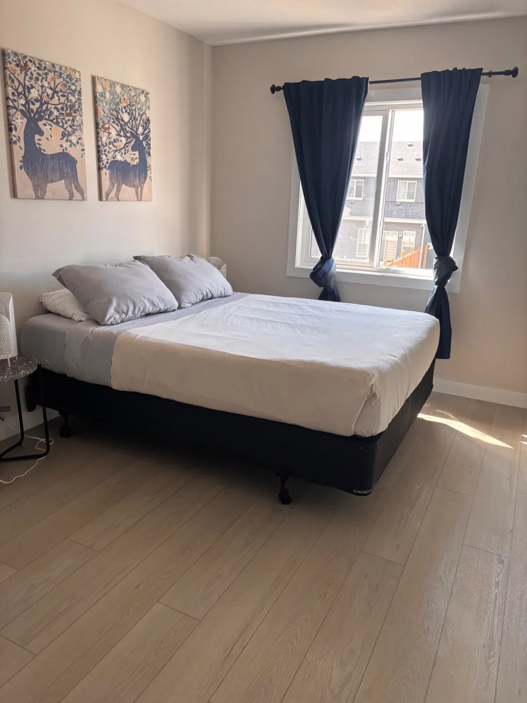 Airbnb bedroom made up with fresh linens after a turnover clean