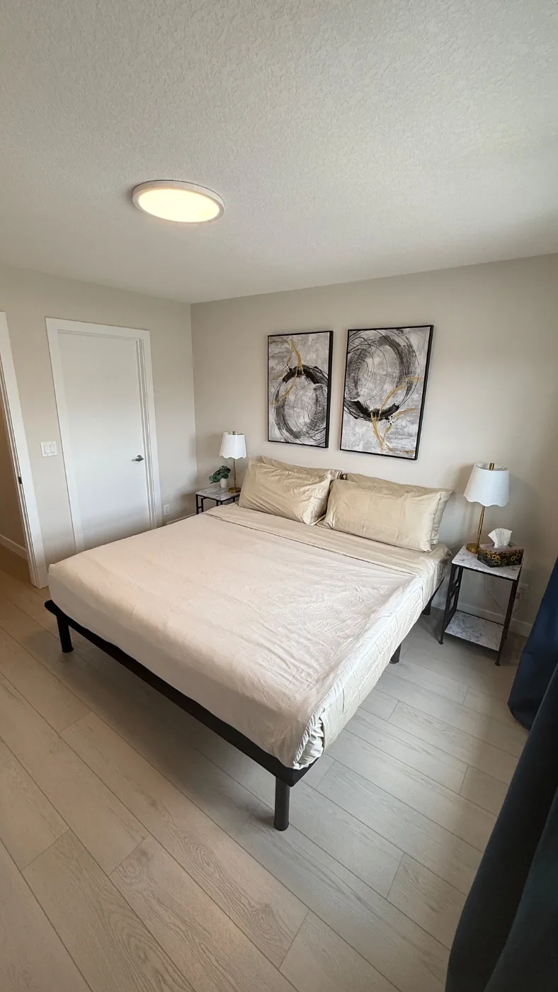 Master bedroom made up with fresh linens after a turnover clean