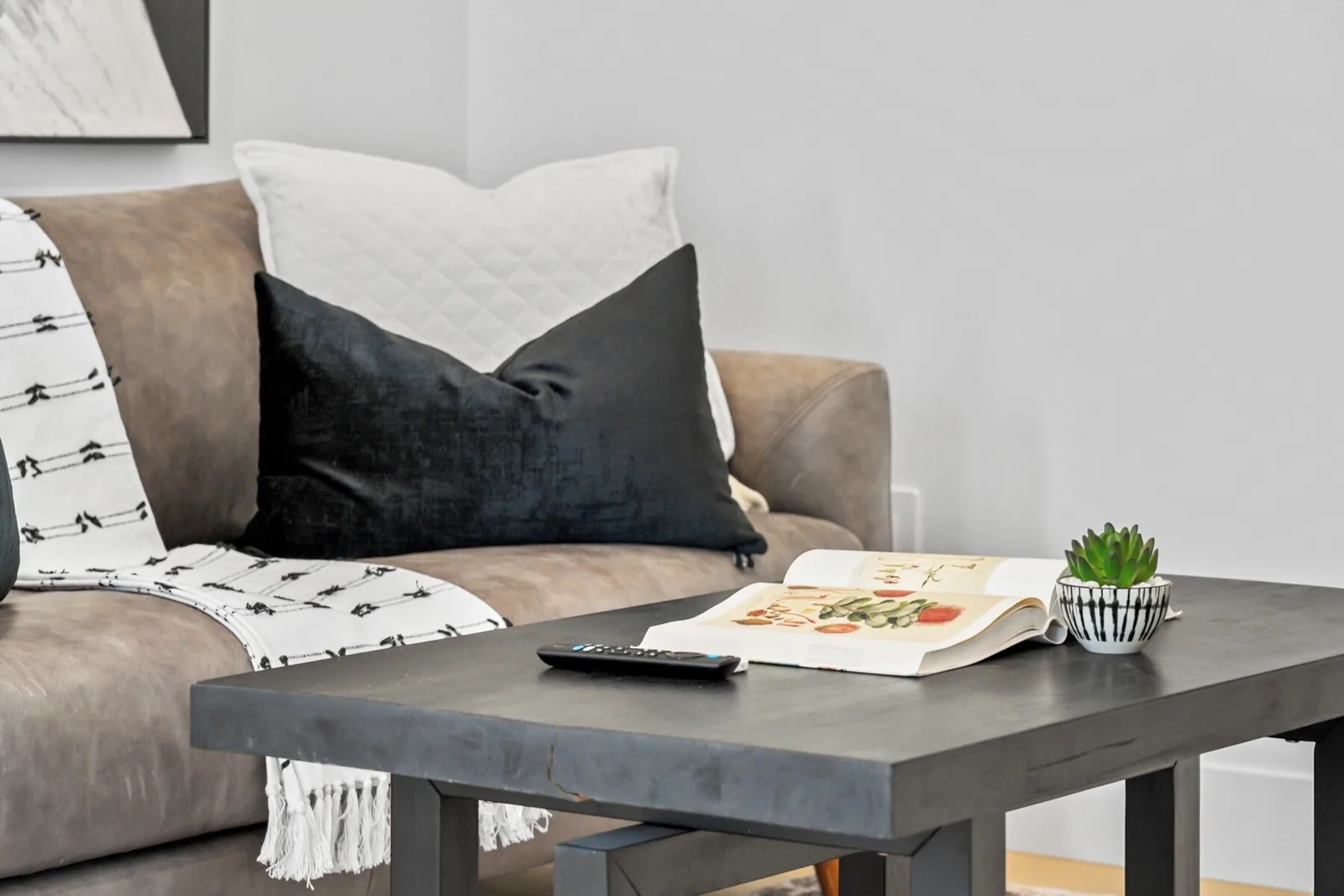 Living room side table styled after a turnover