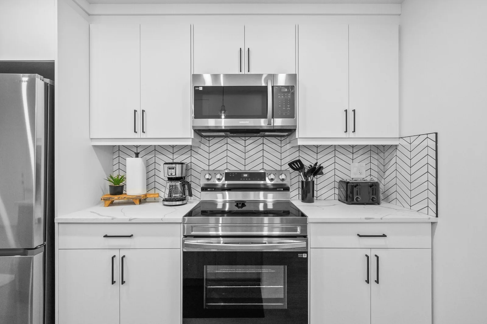 Second kitchen with stainless appliances cleaned between guests