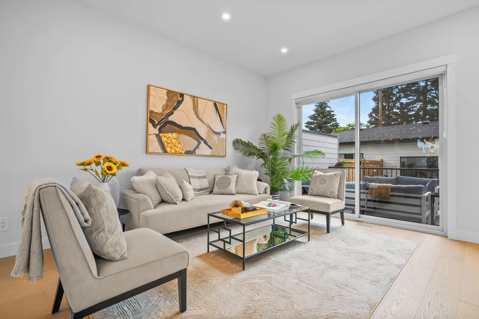 Living room staged with cushions arranged after a clean