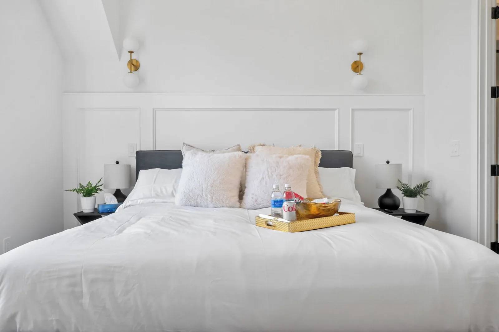 Master bedroom reset with fresh linens in a Tuxedo Park short term rental